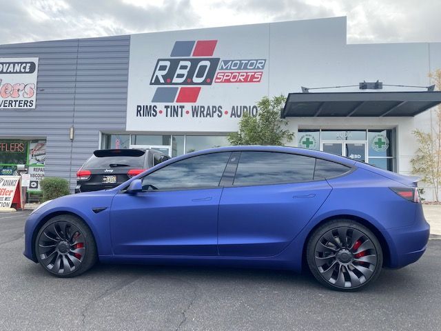 Tesla Model 3 with Ceramic Tint and Custom Black Wheels outside RBO Motorsports