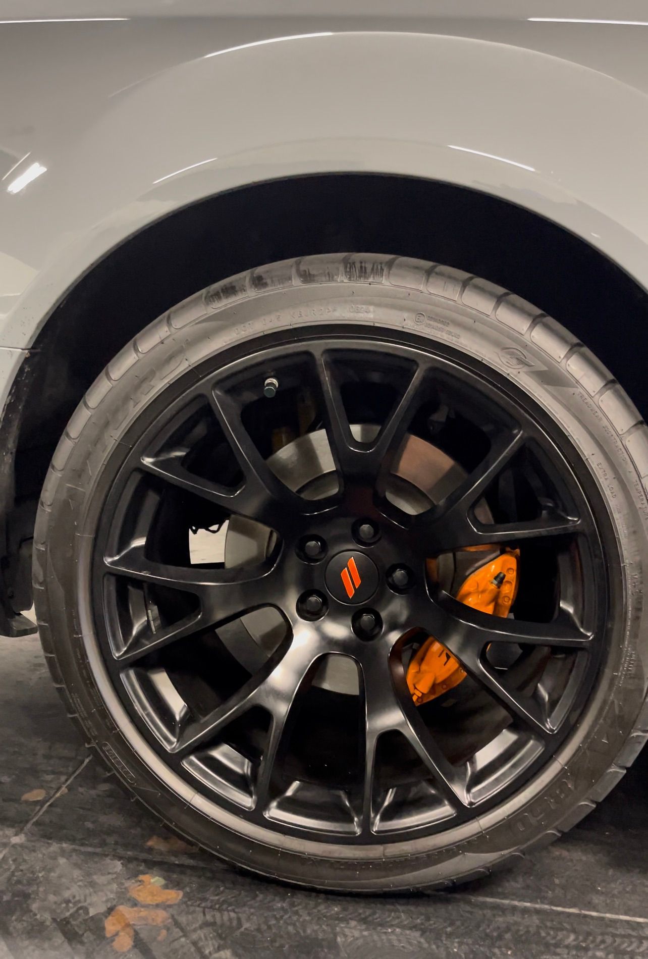 Custom alloy wheel with orange brake caliper